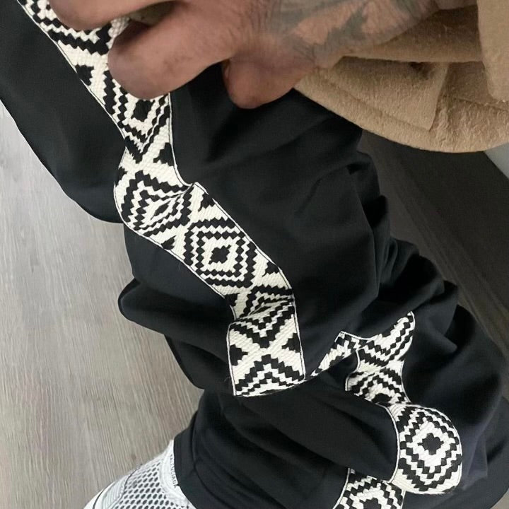 EXTENDED BLACK TRACK PANTS